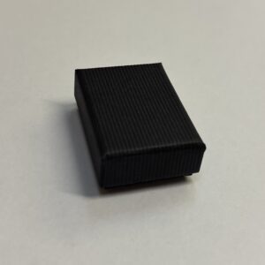 Quality Cardboard No2 Nested box with a matt black corded texture.