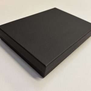 Quality Cardboard Medium Collar box with a matt black corded texture.