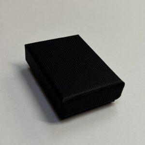 Quality Cardboard No3 Nested box with a matt black corded texture.