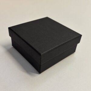 Quality Cardboard Large Universal box with a matt black corded texture.